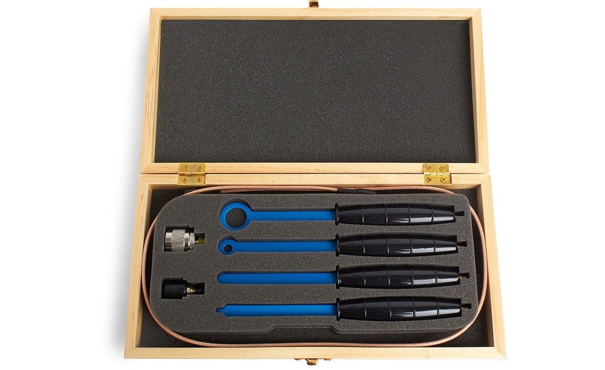 Picture - EMC probes set in wooden box - All probes are couted with blue plastic cover and have black plastic handle. In the package there are also two connectos and one long gold looking cable.